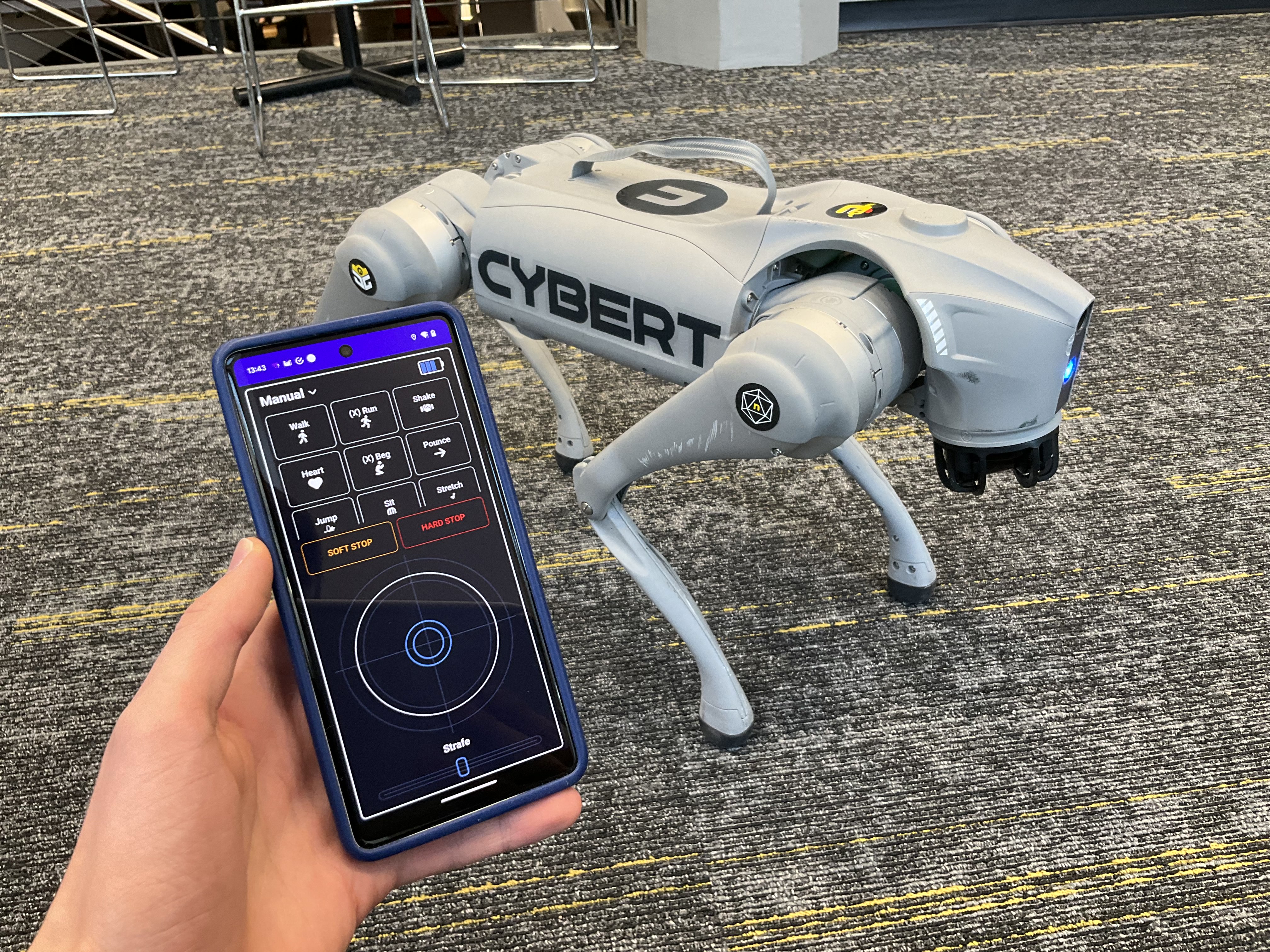 A phone remote controlling the Unitree GO2 Robot Dog